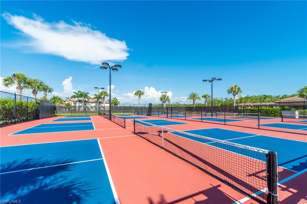 9596 Trevi Court, Unit 5414 Naples, FL 34113 - Photo 21 of 34 a outdoor view with a swimming pool
