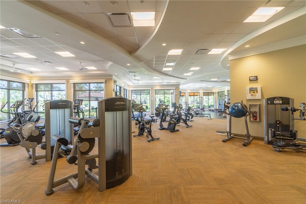 9596 Trevi Court, Unit 5414 Naples, FL 34113 - Photo 30 of 34 a view of a room with gym equipment