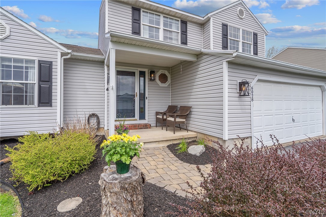 6028 Monopoli Path Cicero, NY 13039 - Photo 3 of 39 Paver entry and covered porch