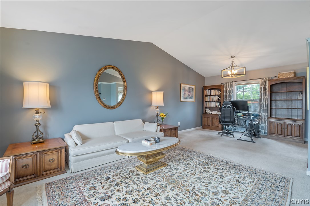 6028 Monopoli Path Cicero, NY 13039 - Photo 5 of 39 Front fliving room with soaring ceilings!