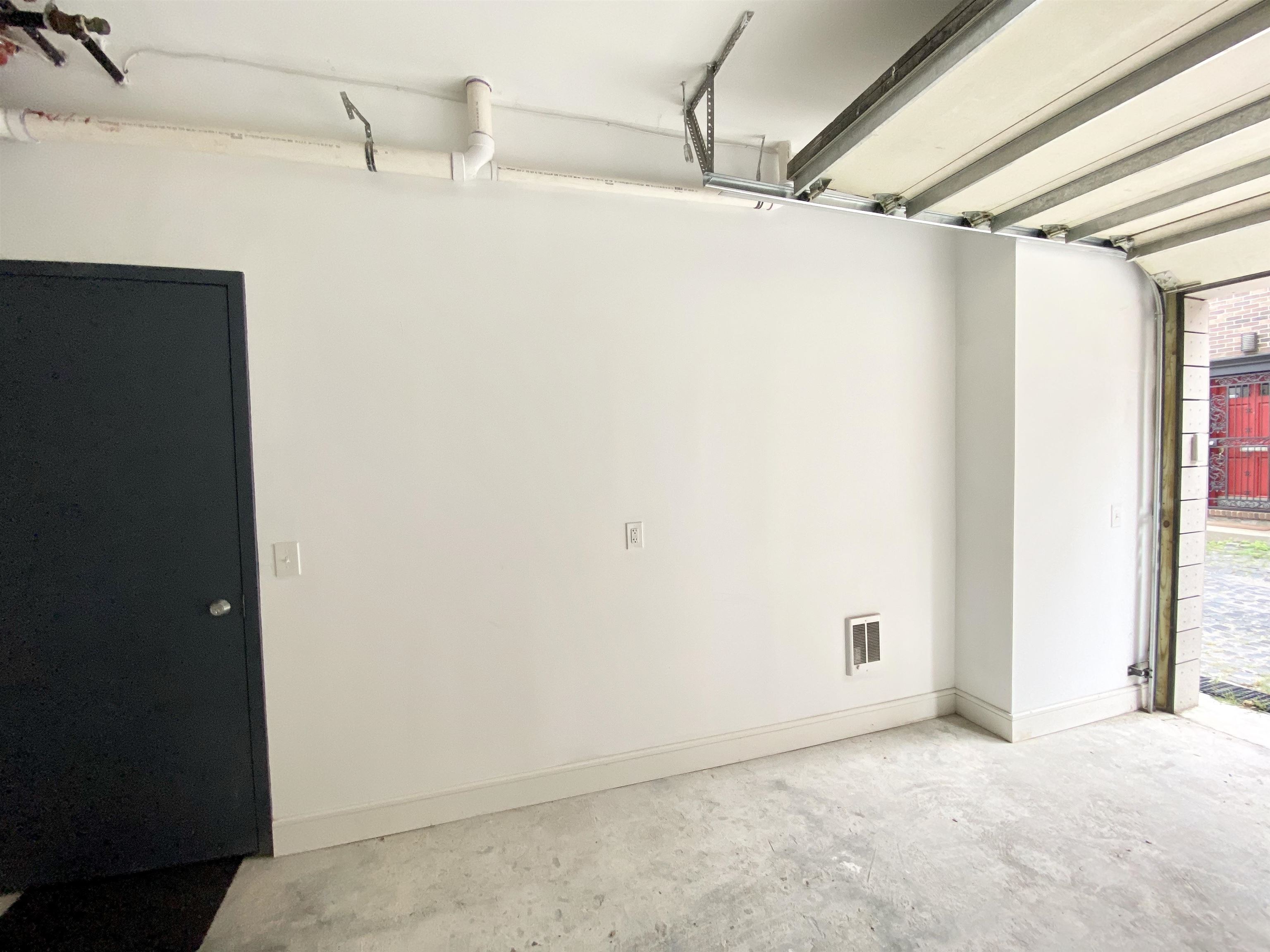 313 Washington Street, Unit 7 Hoboken, NJ 07030 - Photo 14 of 15 a view of a room with racks on the wall