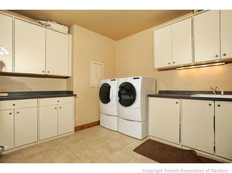 12 Rounds Road Breckenridge, CO 80424 - Photo 20 of 23 a kitchen with a white cabinets and white appliances
