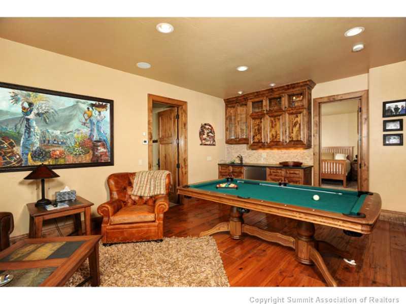 12 Rounds Road Breckenridge, CO 80424 - Photo 21 of 23 a living room with furniture and a flat screen tv