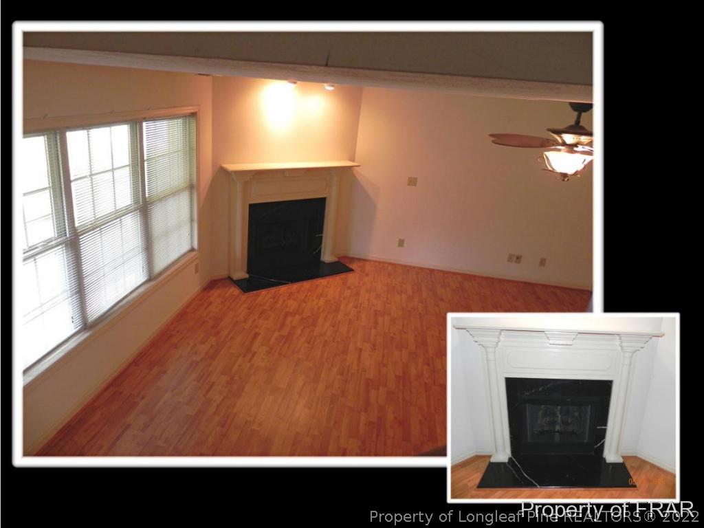 596 East Lake Ridge Road Raeford, NC 28376 - Photo 14 of 25 a view of empty room with a fireplace