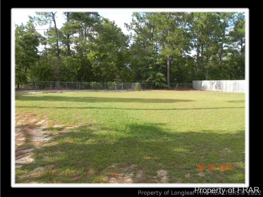 596 East Lake Ridge Road Raeford, NC 28376 - Photo 7 of 25 a view of beach and yard