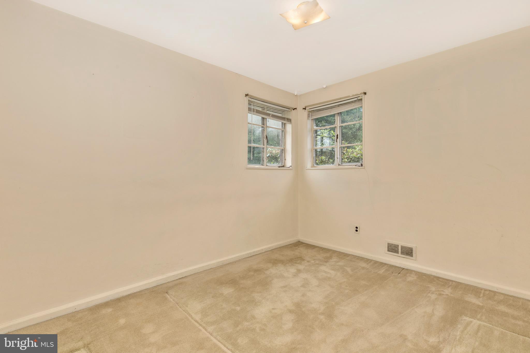 3929 Weller Road Silver Spring, MD 20906 - Photo 21 of 54 an empty room with windows