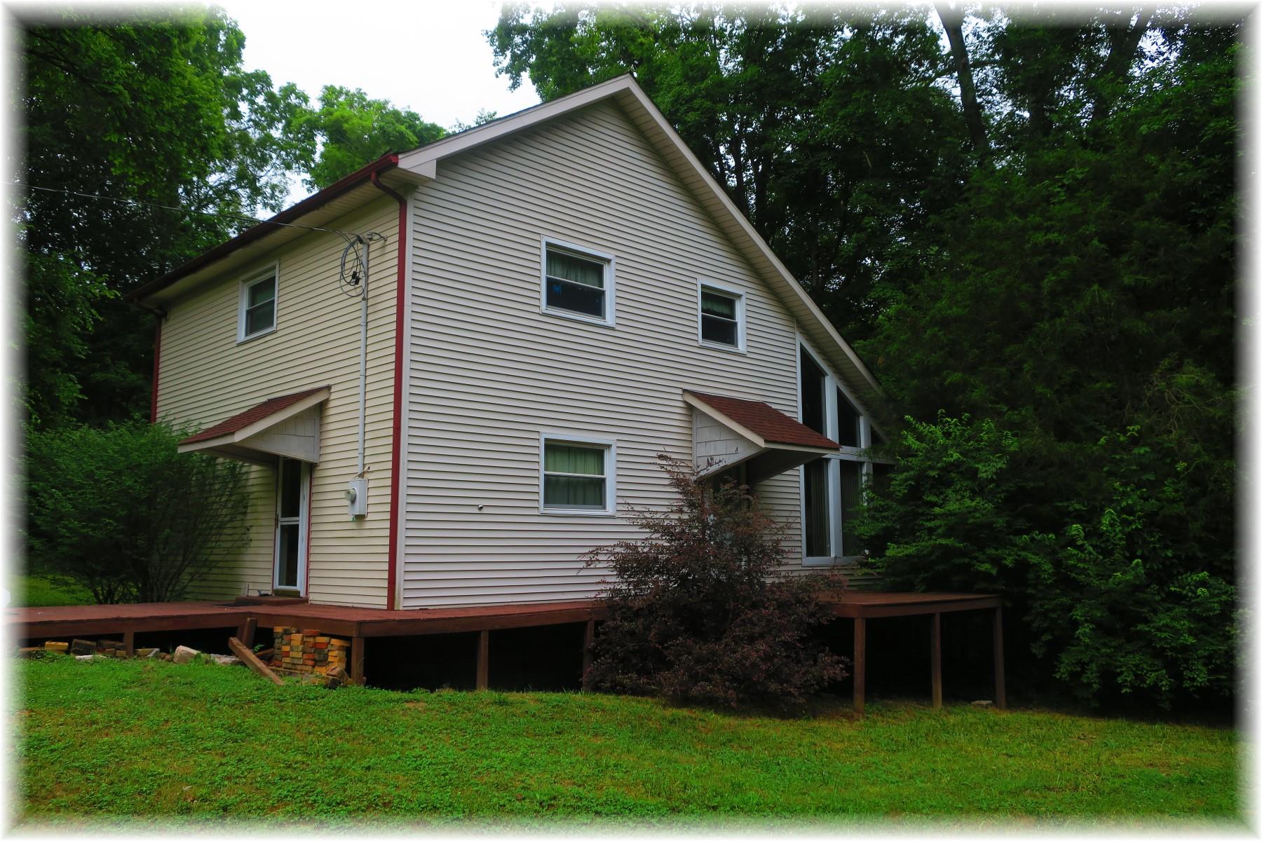 603 Thompson Road Pegram, TN 37143 - Photo 1 of 14 a view of a house with backyard and garden