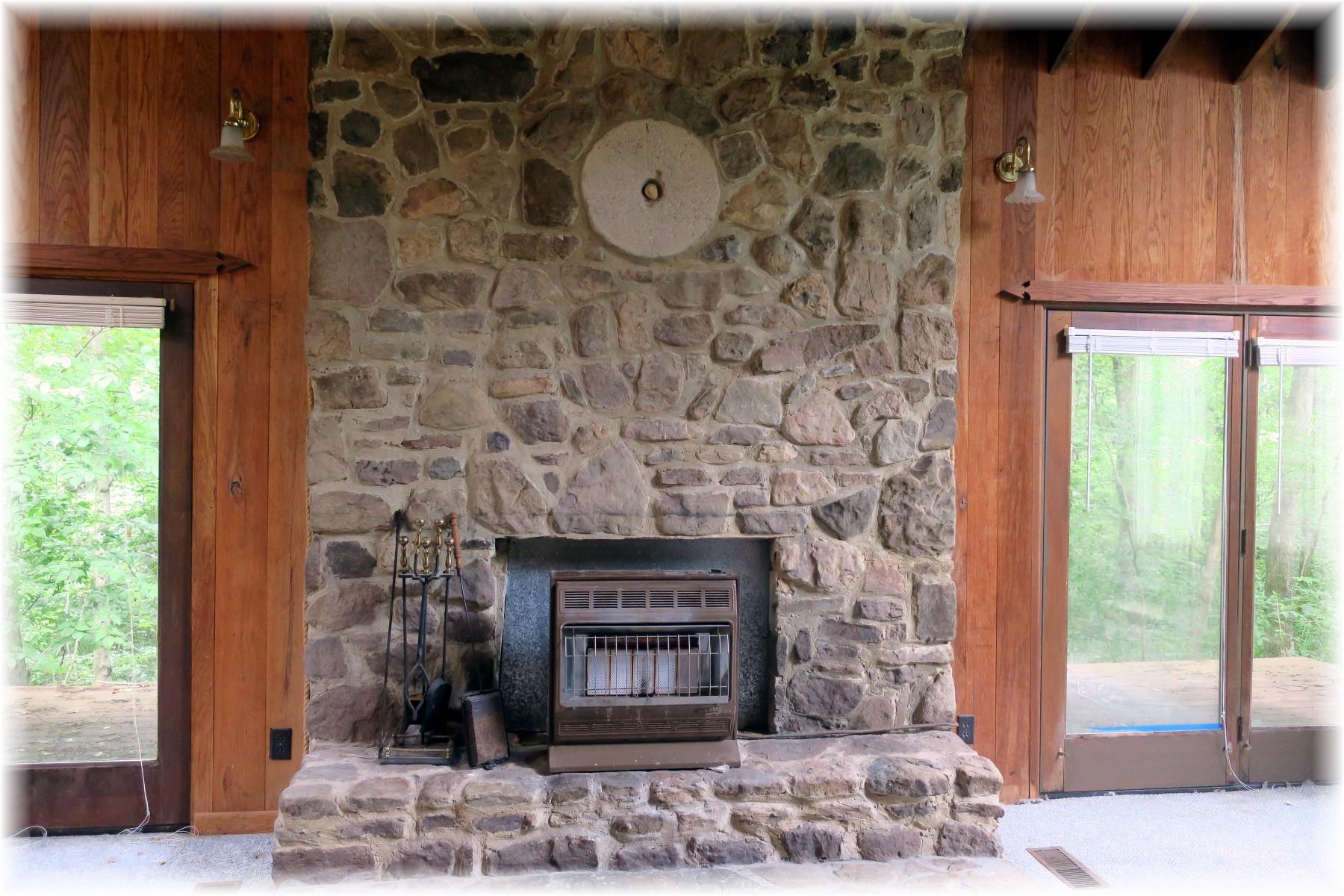 603 Thompson Road Pegram, TN 37143 - Photo 9 of 14 a stone house with fireplace