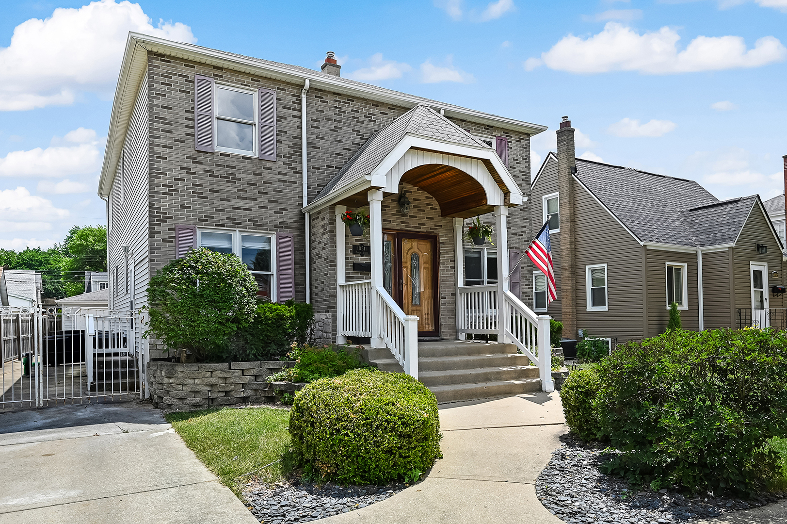10511 South Hamlin Avenue Chicago, IL 60655 - Photo 2 of 23 a front view of a house with garden
