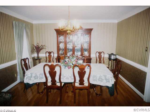 13241 Carters Way Road Chesterfield, VA 23838 - Photo 2 of 11 a view of a dining room with furniture and wooden floor