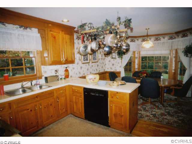 13241 Carters Way Road Chesterfield, VA 23838 - Photo 3 of 11 a kitchen with a sink stove and cabinets