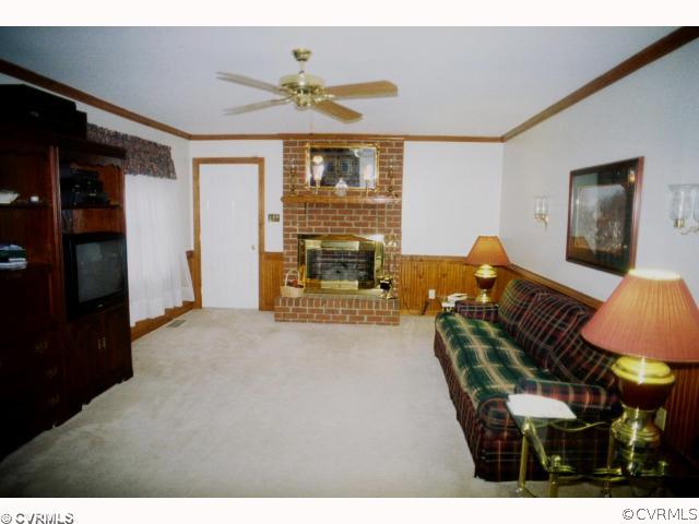 13241 Carters Way Road Chesterfield, VA 23838 - Photo 5 of 11 a living room with furniture and a fireplace