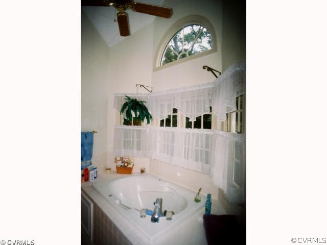13241 Carters Way Road Chesterfield, VA 23838 - Photo 8 of 11 a bathroom with a sink and a mirror