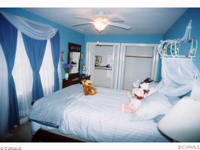 13241 Carters Way Road Chesterfield, VA 23838 - Photo 9 of 11 a bedroom with a bed and ceiling fan