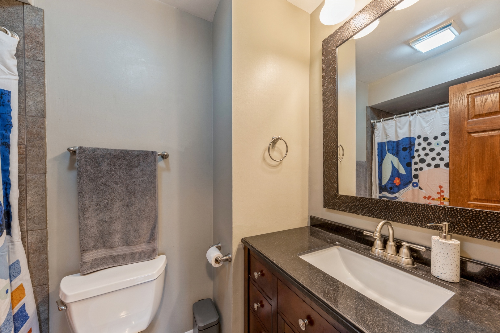 151 East Palatine Road, Unit 4 Palatine, IL 60067 - Photo 13 of 17 a bathroom with a toilet sink and mirror