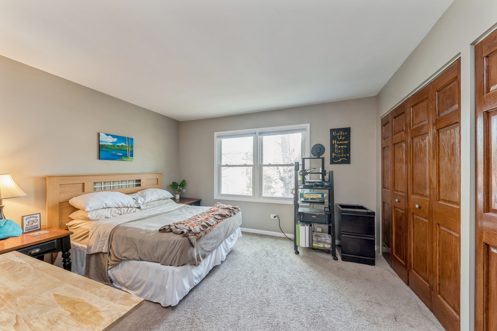 151 East Palatine Road, Unit 4 Palatine, IL 60067 - Photo 14 of 17 a bedroom with a bed and a window