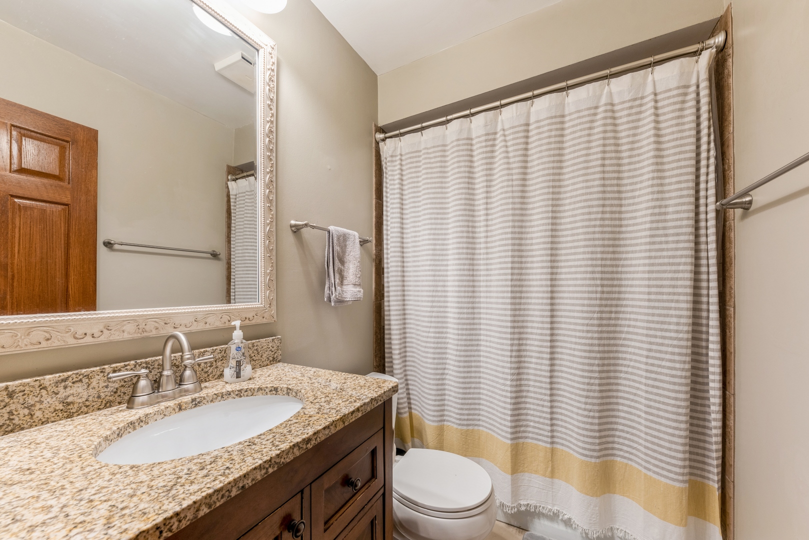 151 East Palatine Road, Unit 4 Palatine, IL 60067 - Photo 15 of 17 a bathroom with a granite countertop sink toilet and mirror