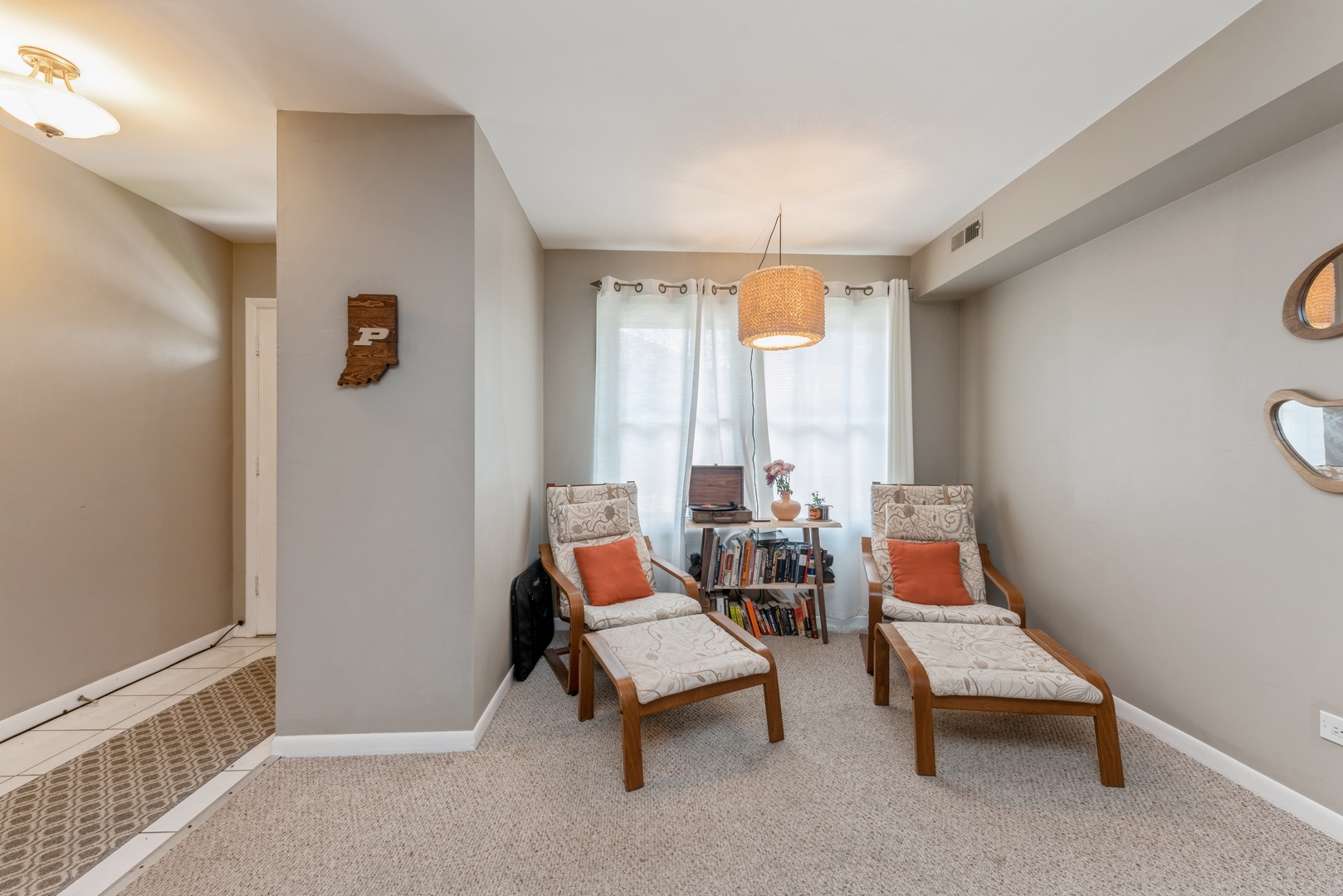 151 East Palatine Road, Unit 4 Palatine, IL 60067 - Photo 5 of 17 a living room with furniture and a window