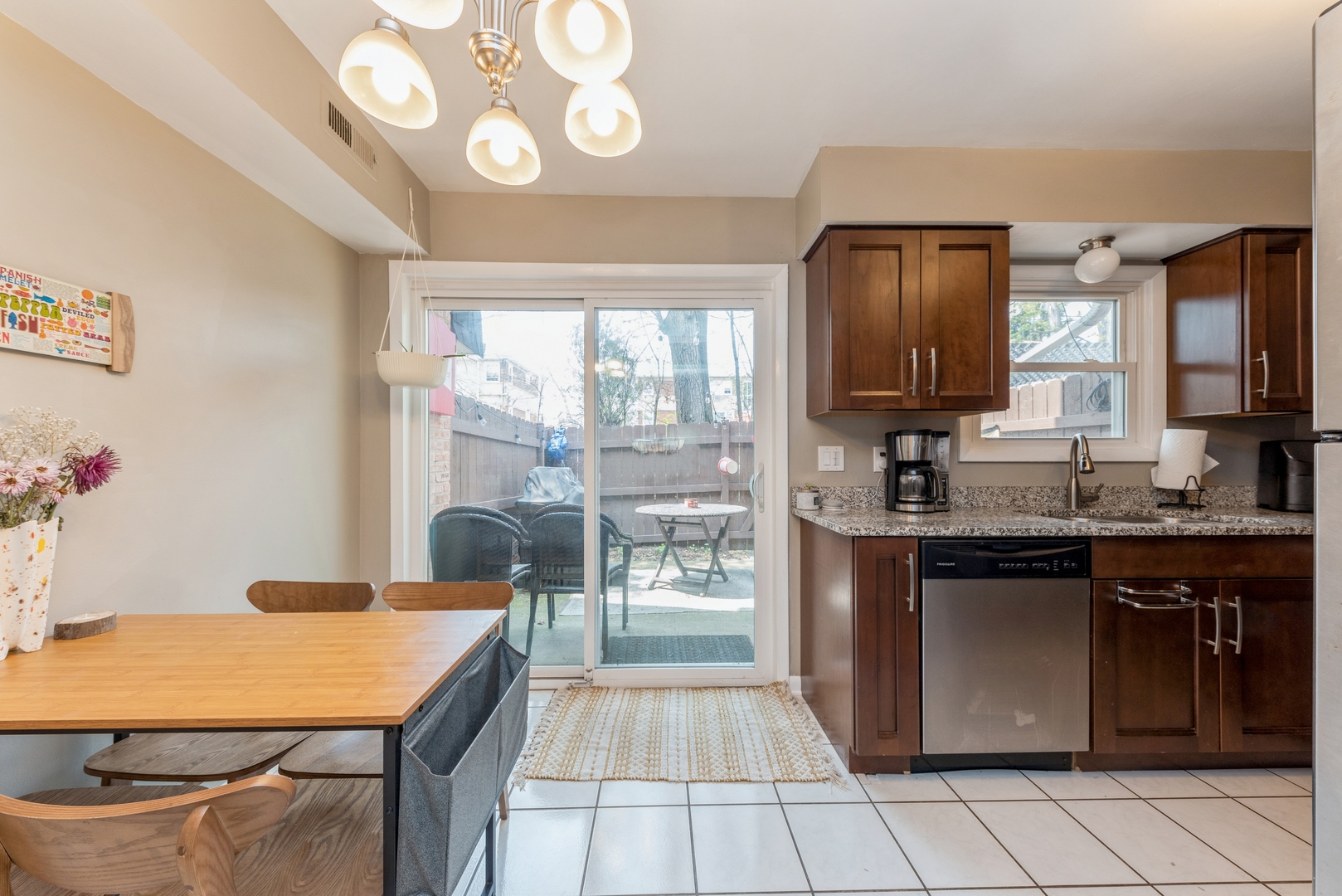 151 East Palatine Road, Unit 4 Palatine, IL 60067 - Photo 6 of 17 a kitchen with stainless steel appliances granite countertop a sink and a stove