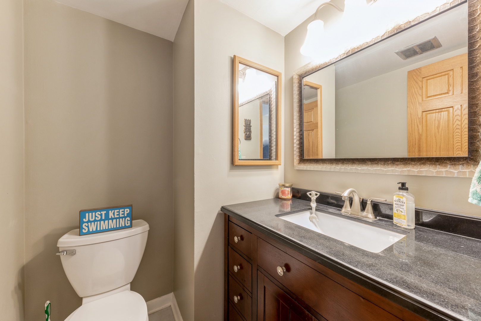 151 East Palatine Road, Unit 4 Palatine, IL 60067 - Photo 10 of 17 a bathroom with a granite countertop toilet sink and mirror