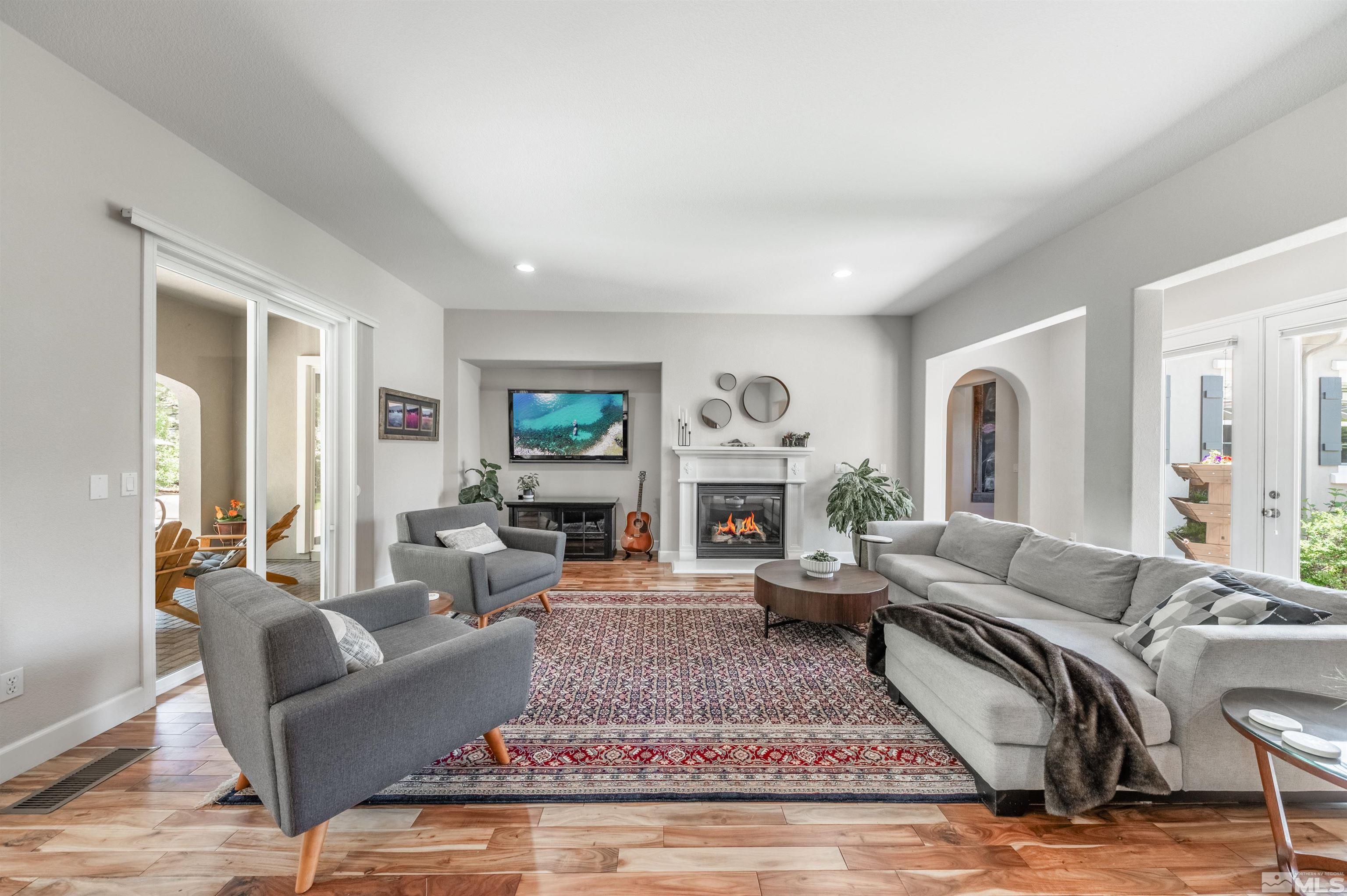 8580 Timaru Trail Reno, NV 89523 - Photo 11 of 40 a living room with furniture and a fireplace