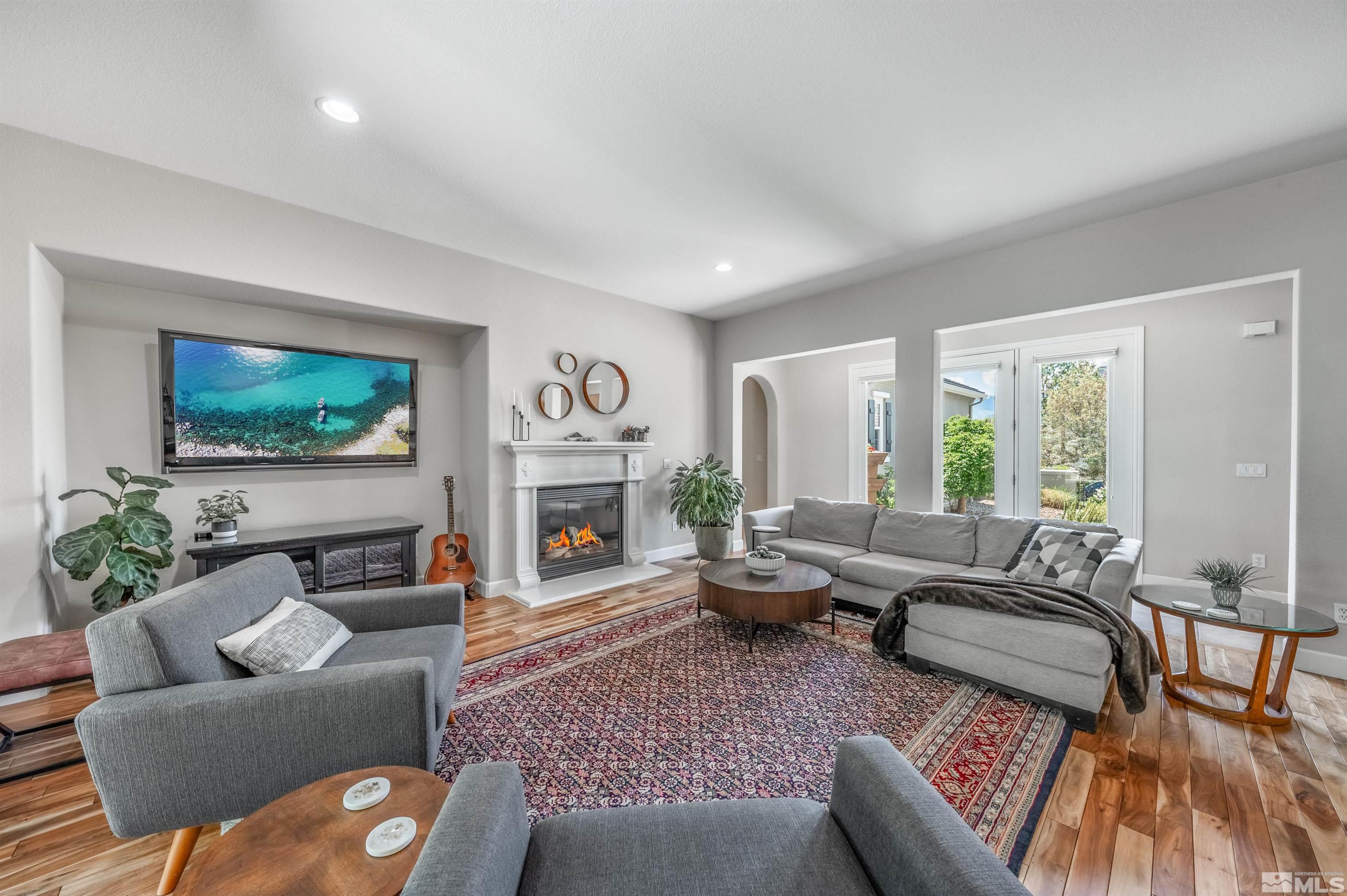 8580 Timaru Trail Reno, NV 89523 - Photo 12 of 40 a living room with furniture or couch and a flat screen tv