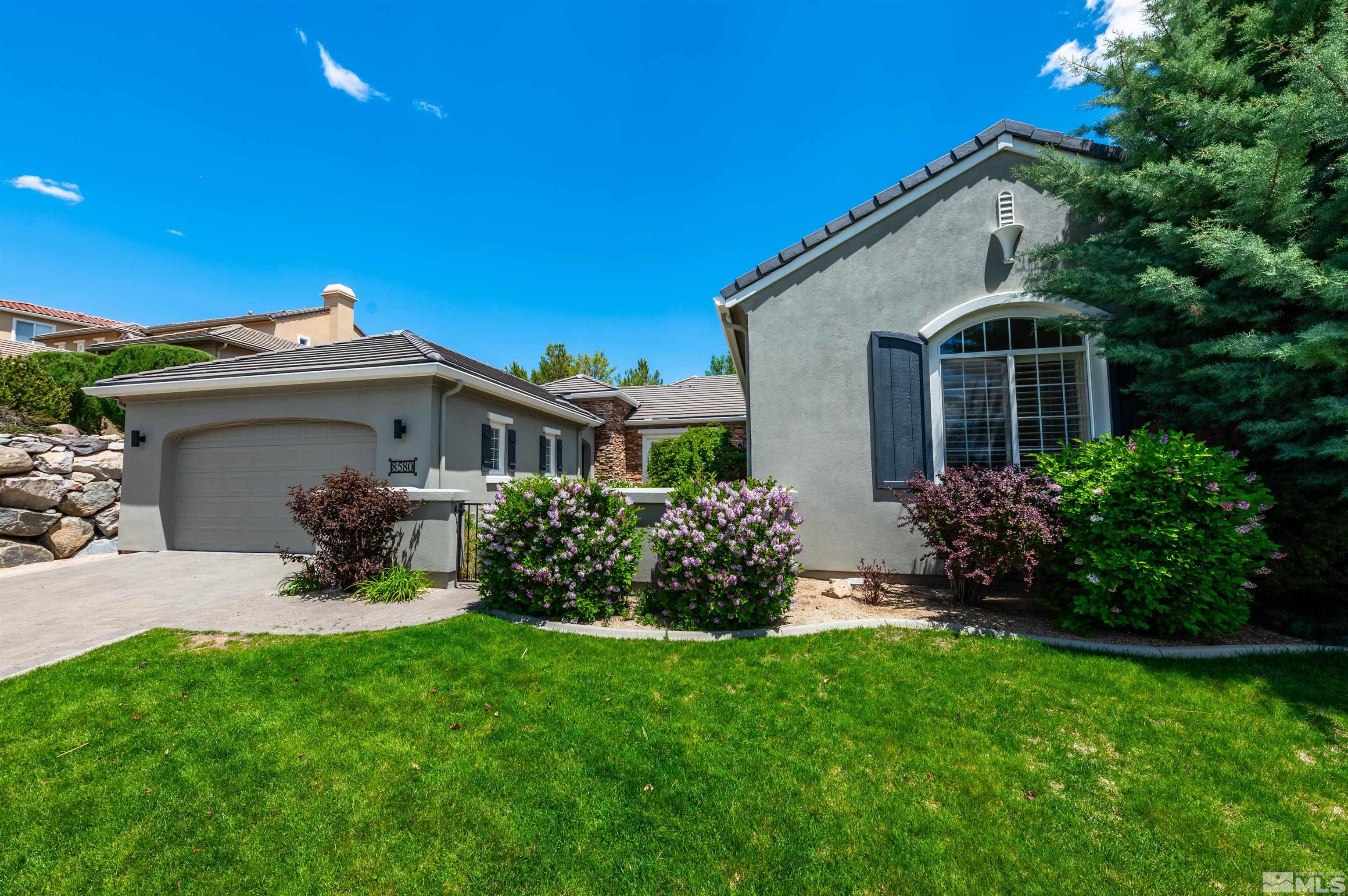 8580 Timaru Trail Reno, NV 89523 - Photo 2 of 40 a front view of a house with garden