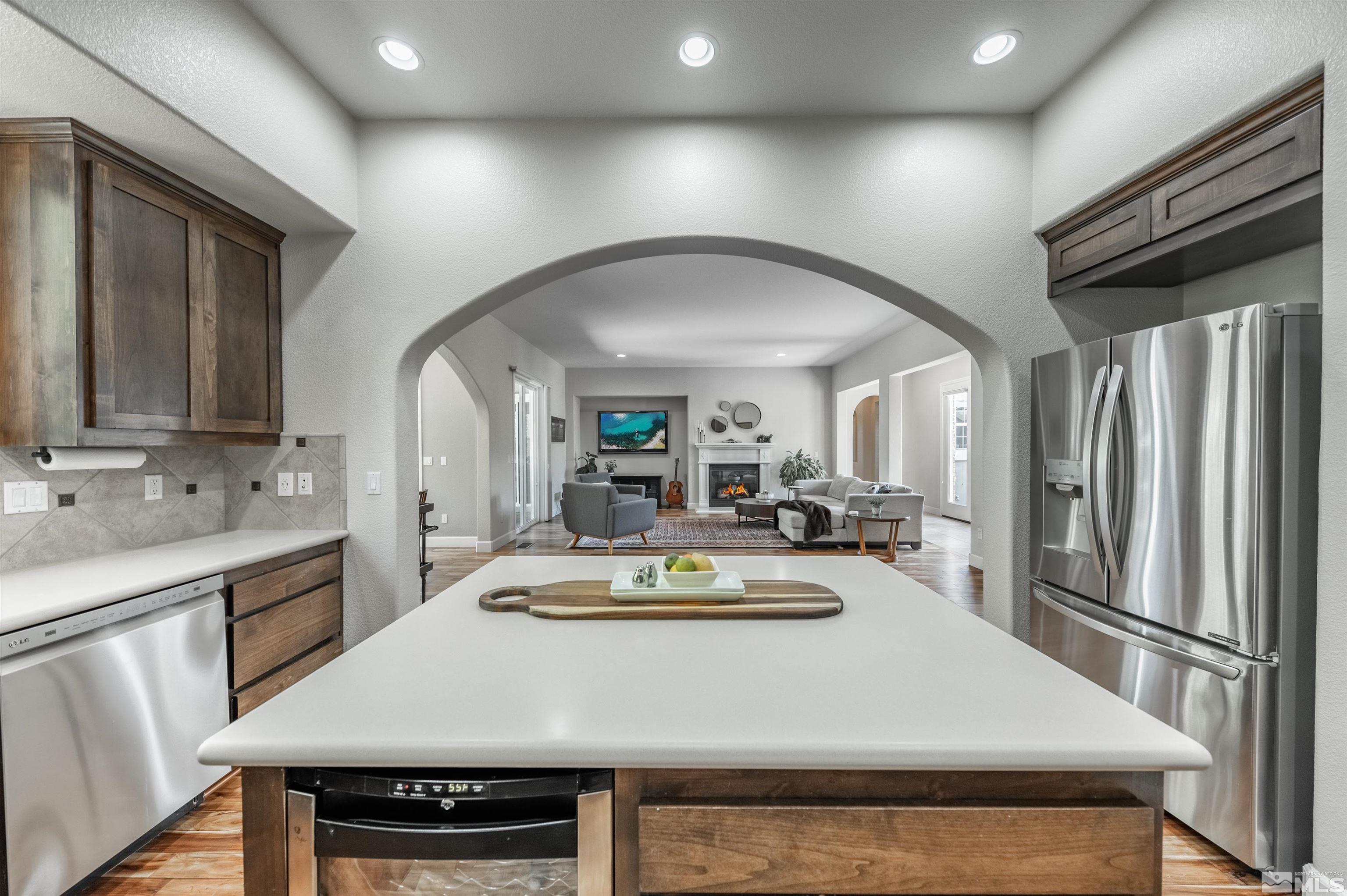 8580 Timaru Trail Reno, NV 89523 - Photo 21 of 40 a large kitchen with a table and chairs