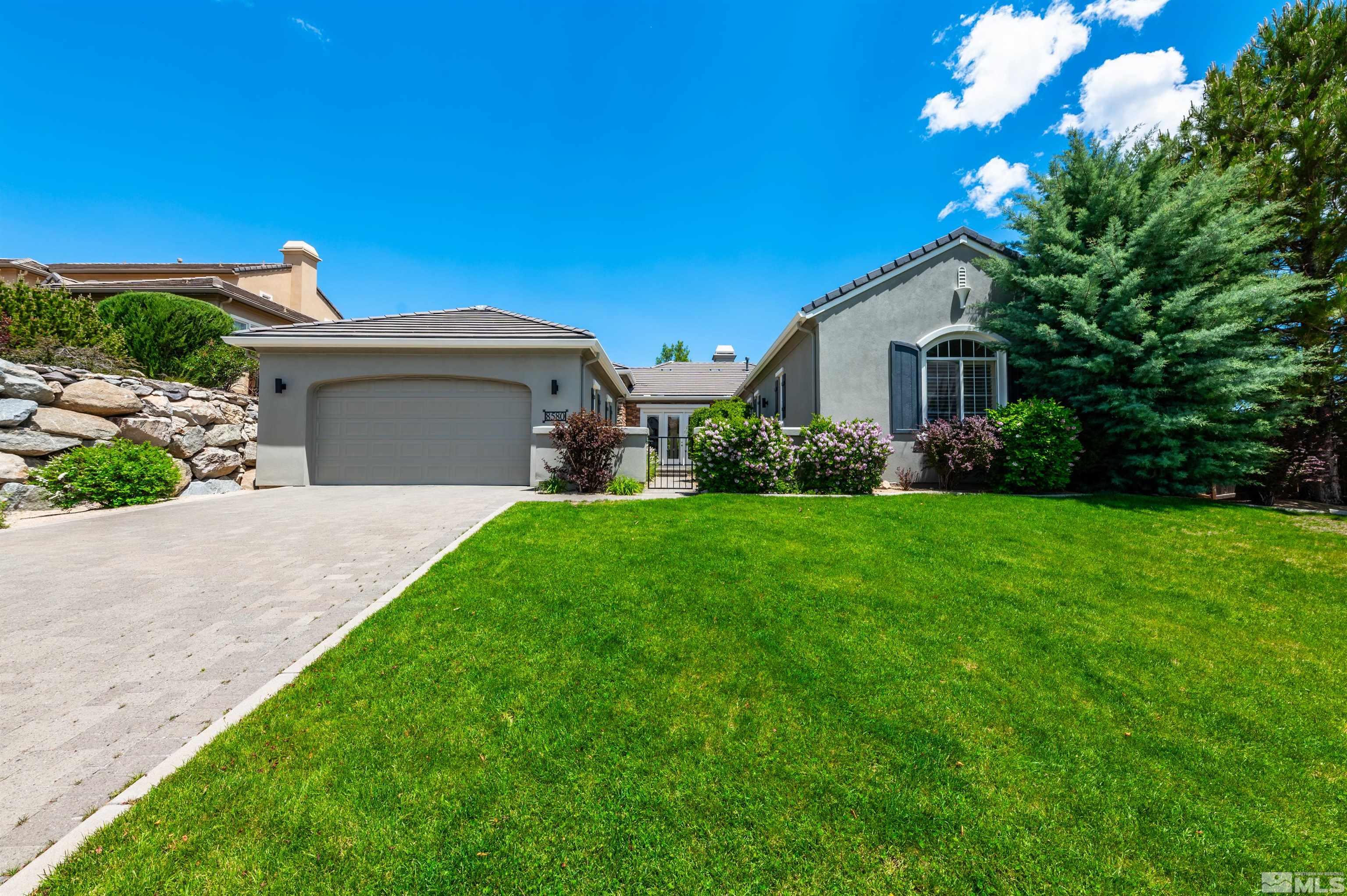 8580 Timaru Trail Reno, NV 89523 - Photo 3 of 40 a front view of a house with garden