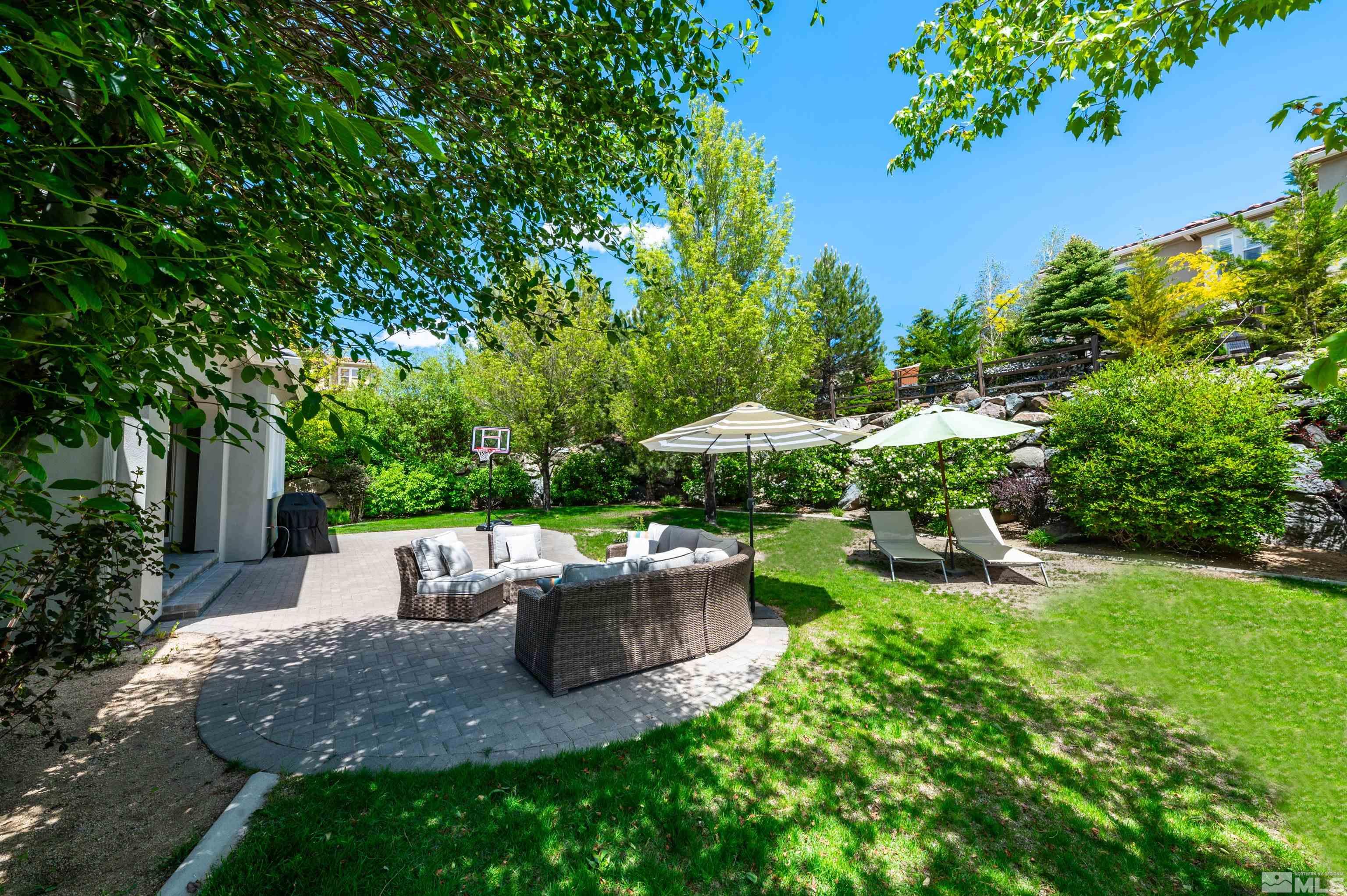 8580 Timaru Trail Reno, NV 89523 - Photo 34 of 40 a view of a garden with a patio