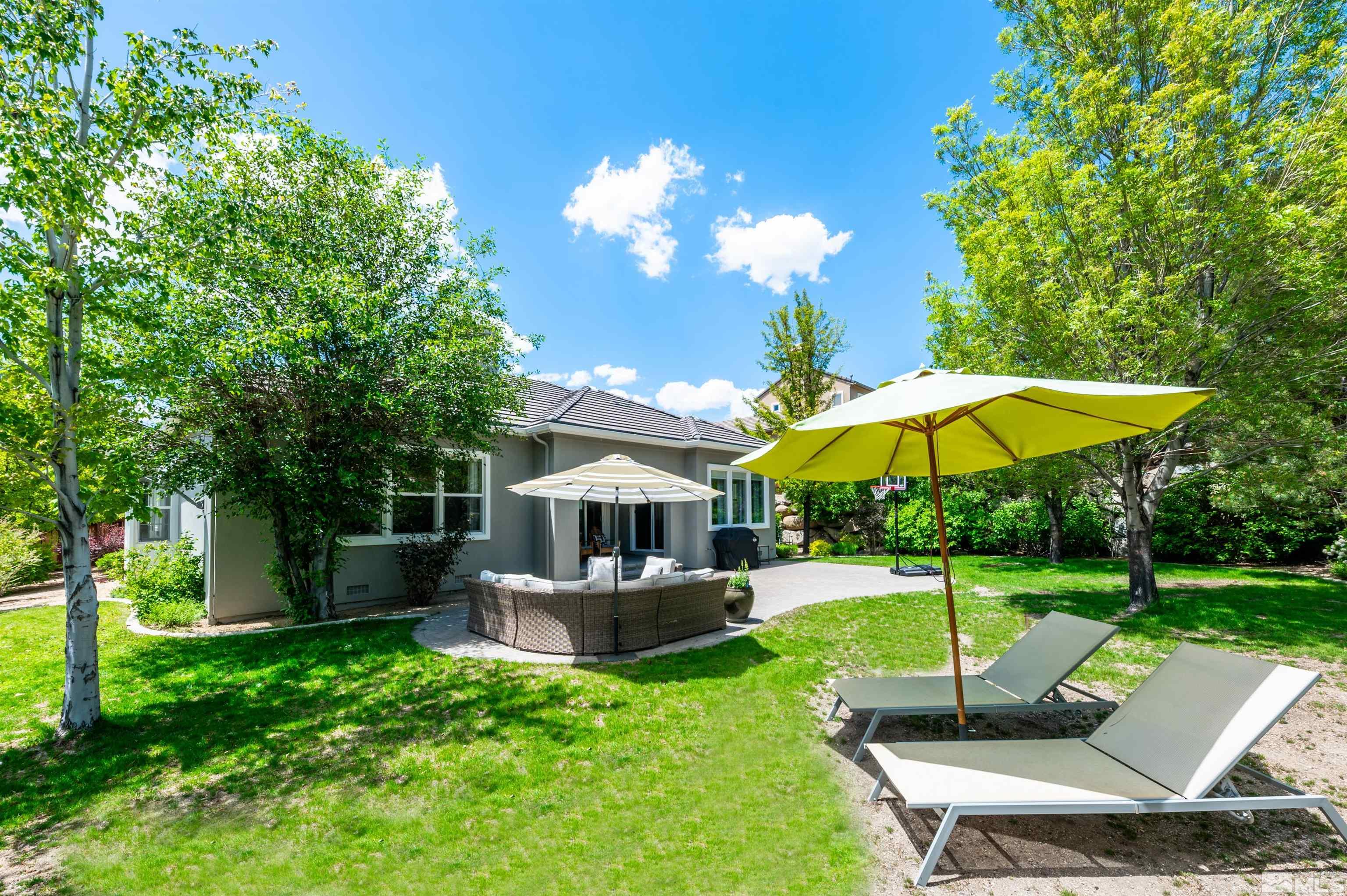 8580 Timaru Trail Reno, NV 89523 - Photo 35 of 40 a view of a house with backyard and sitting area