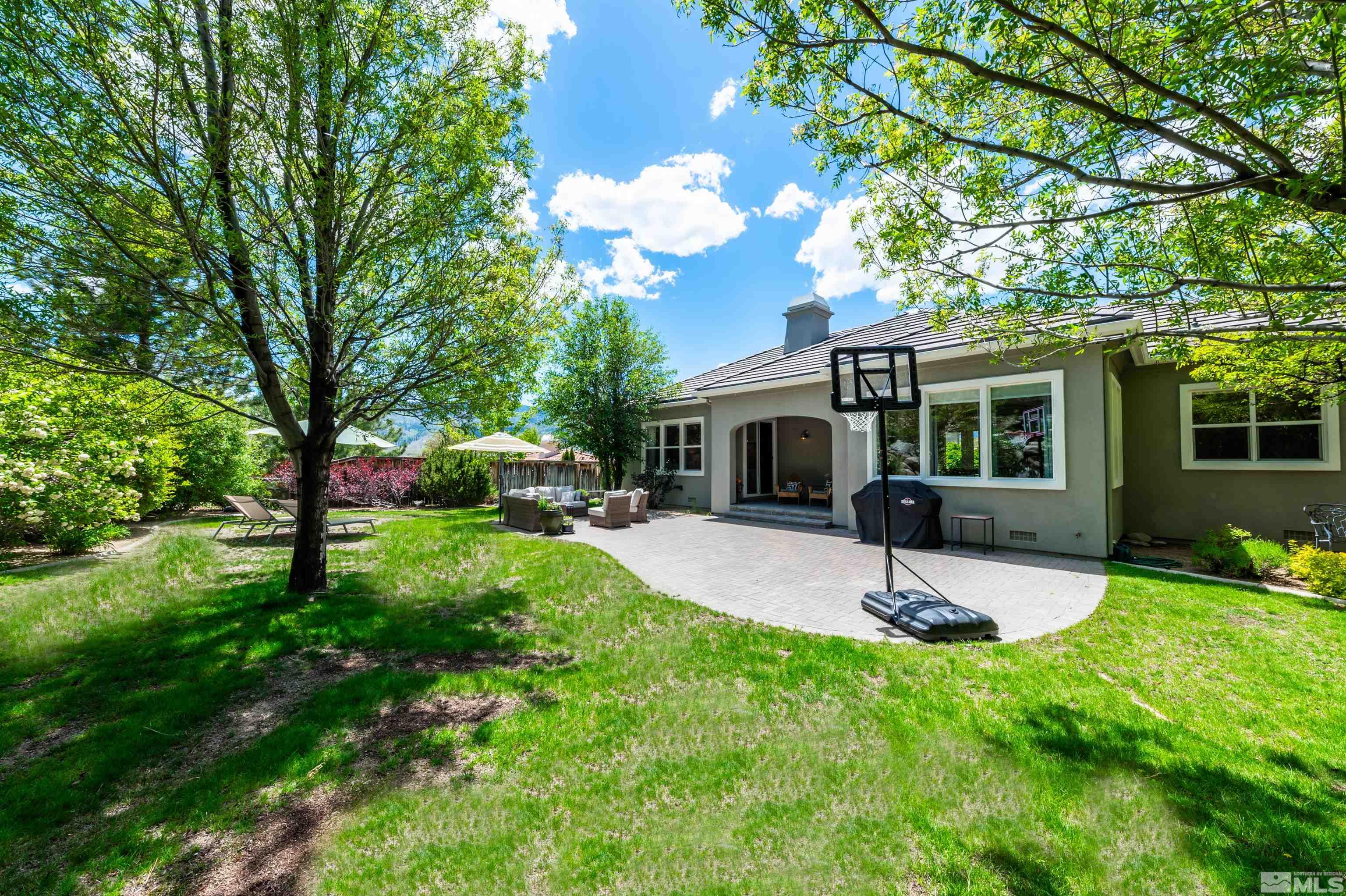 8580 Timaru Trail Reno, NV 89523 - Photo 36 of 40 a house view with a sitting space and garden