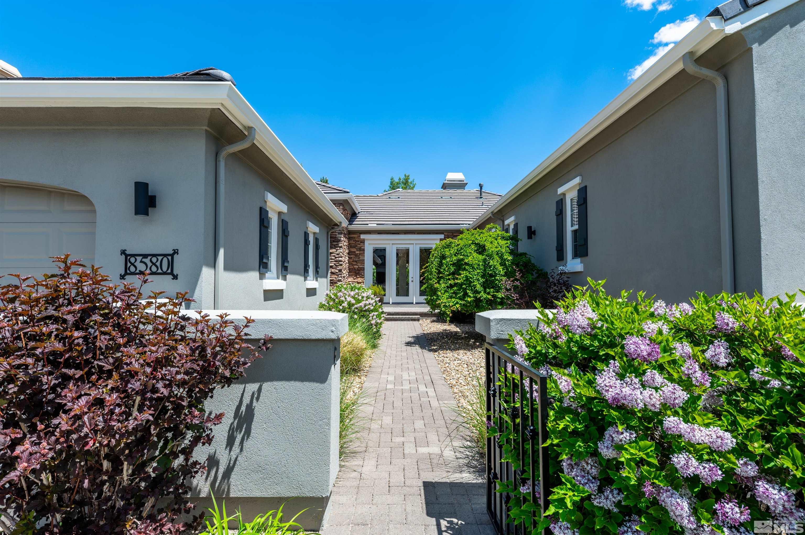 8580 Timaru Trail Reno, NV 89523 - Photo 6 of 40 a front view of a house with plants
