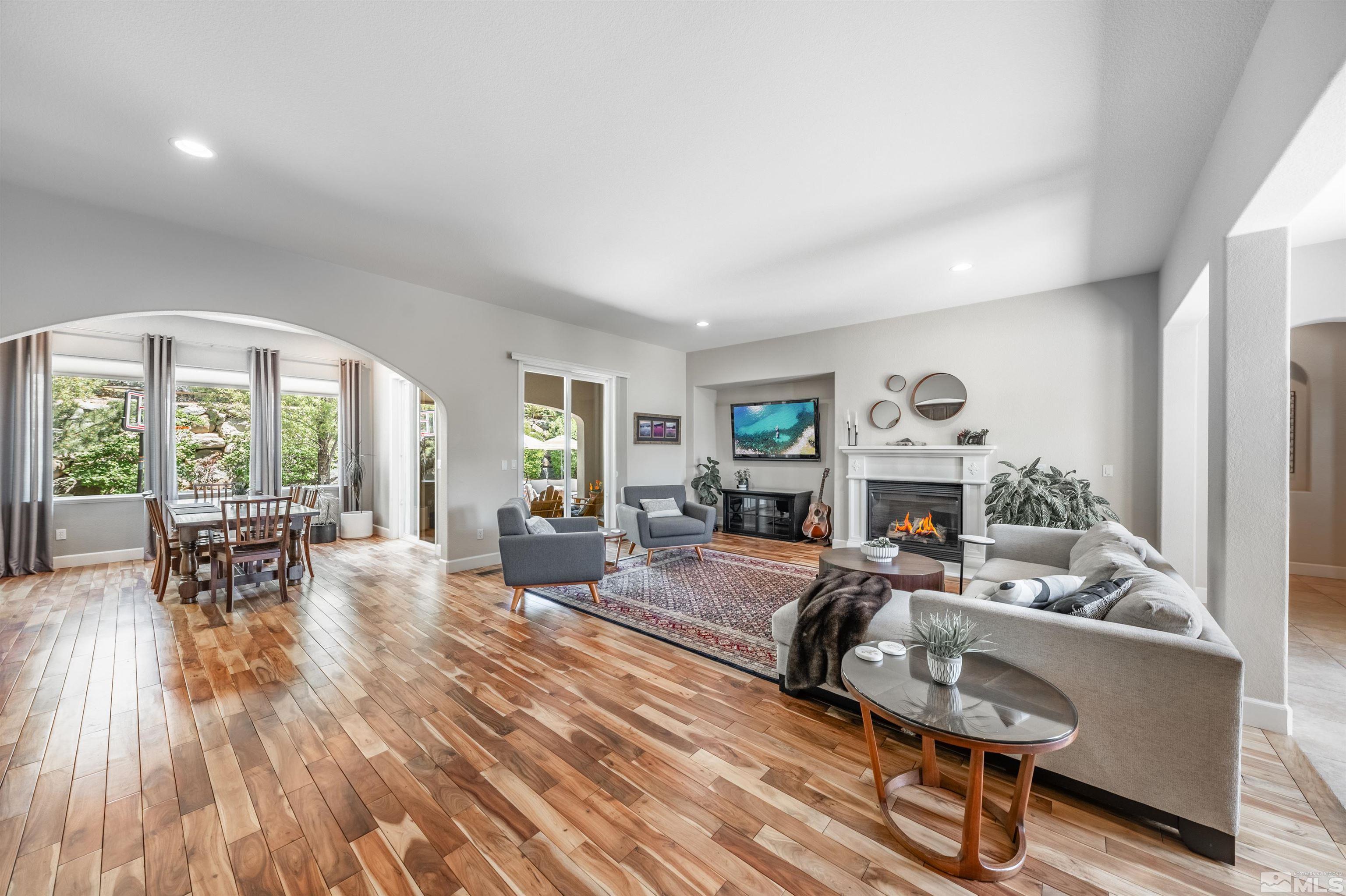 8580 Timaru Trail Reno, NV 89523 - Photo 10 of 40 a living room with furniture and a wooden floor
