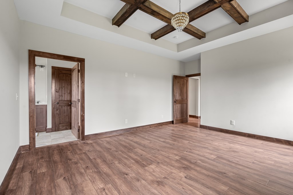 39 Mountaintown Overlook Ellijay, GA 30540 - Photo 26 of 51 a view of an empty room with window and a ceiling fan