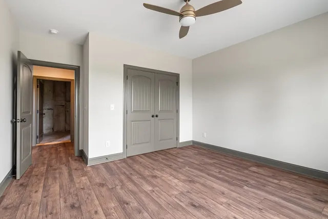 a view of a room with large window and shower