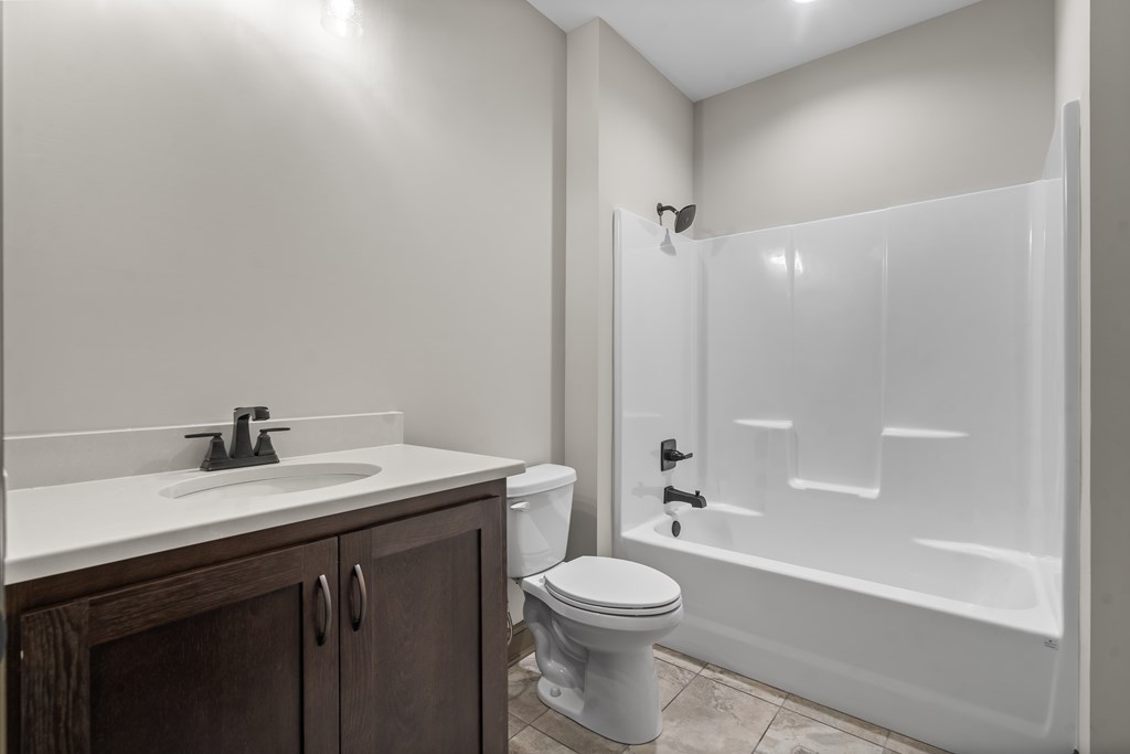 39 Mountaintown Overlook Ellijay, GA 30540 - Photo 49 of 51 a bathroom with a sink a toilet and shower