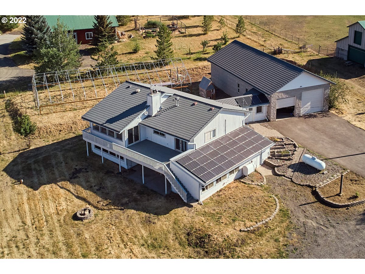 62333 Tucker Down Road Joseph, OR 97846 - Photo 1 of 32 an aerial view of a house with a yard