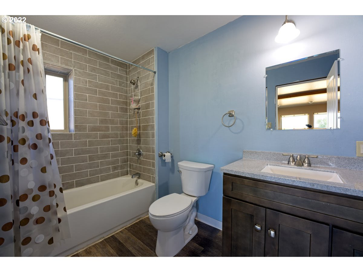62333 Tucker Down Road Joseph, OR 97846 - Photo 15 of 32 a bathroom with a sink a toilet and shower