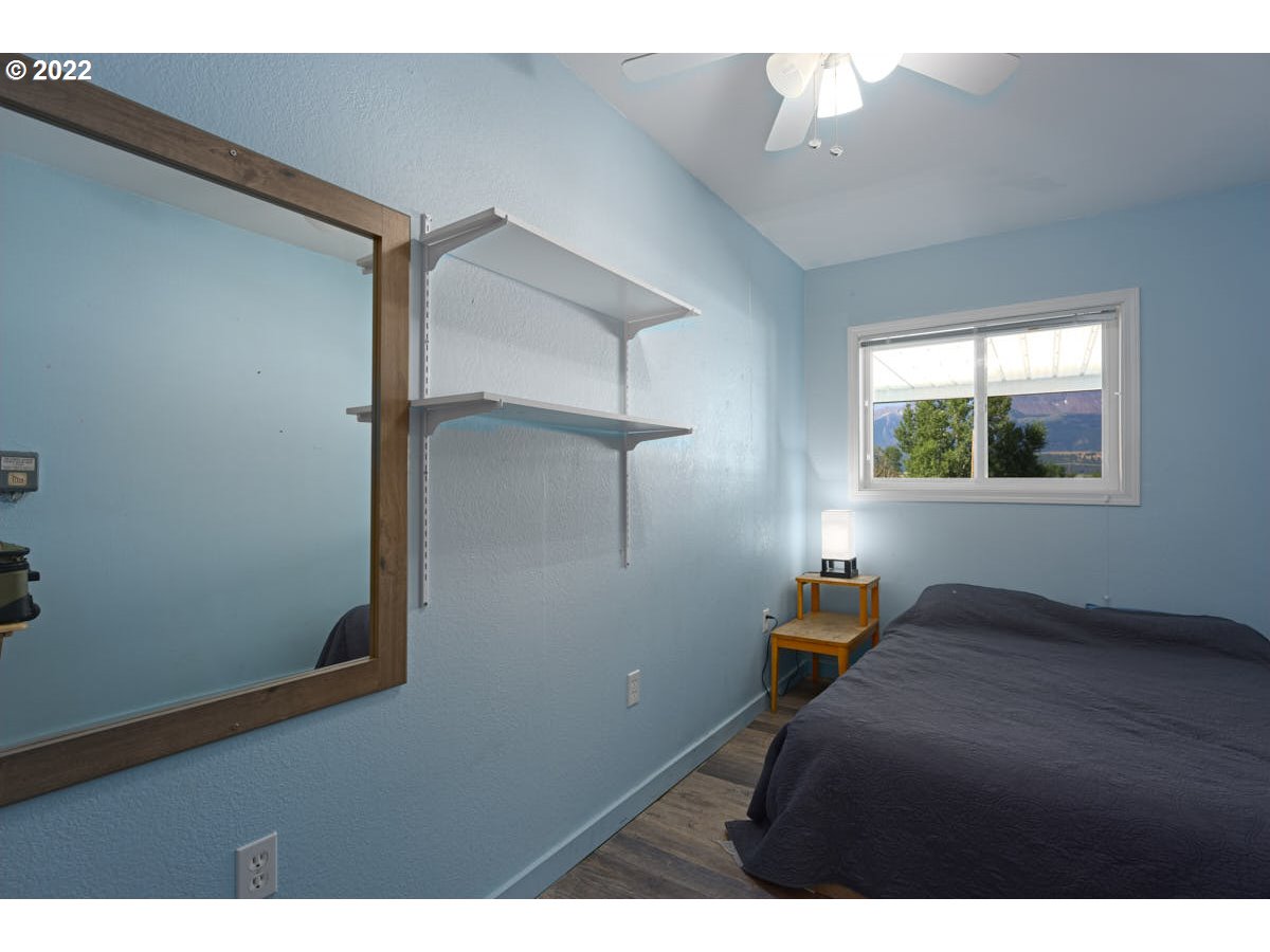 62333 Tucker Down Road Joseph, OR 97846 - Photo 17 of 32 a bedroom with a bed and a window