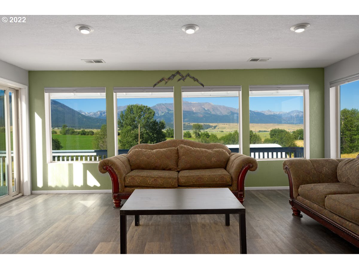 62333 Tucker Down Road Joseph, OR 97846 - Photo 3 of 32 a living room with furniture and a large window