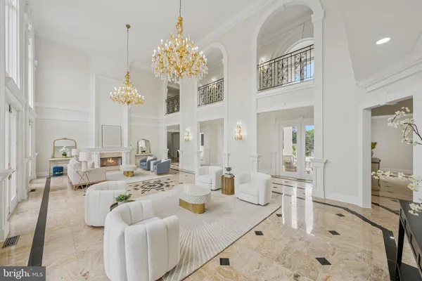 a view of a patio with table and chairs and potted plants