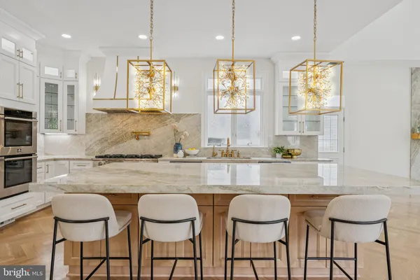 a bathroom with a sink toilet and mirror