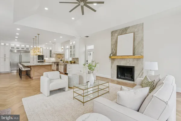 a bedroom with a large bed and a couch