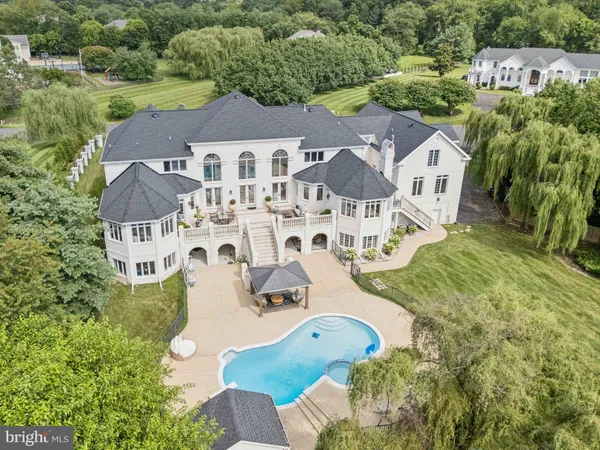 an aerial view of a house with a garden