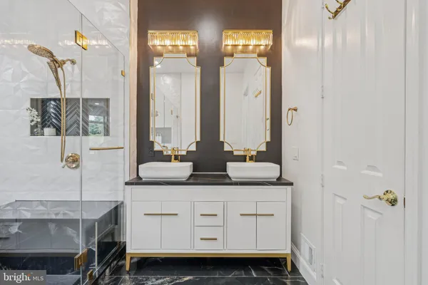 an aerial view of a house with swimming pool and outdoor space