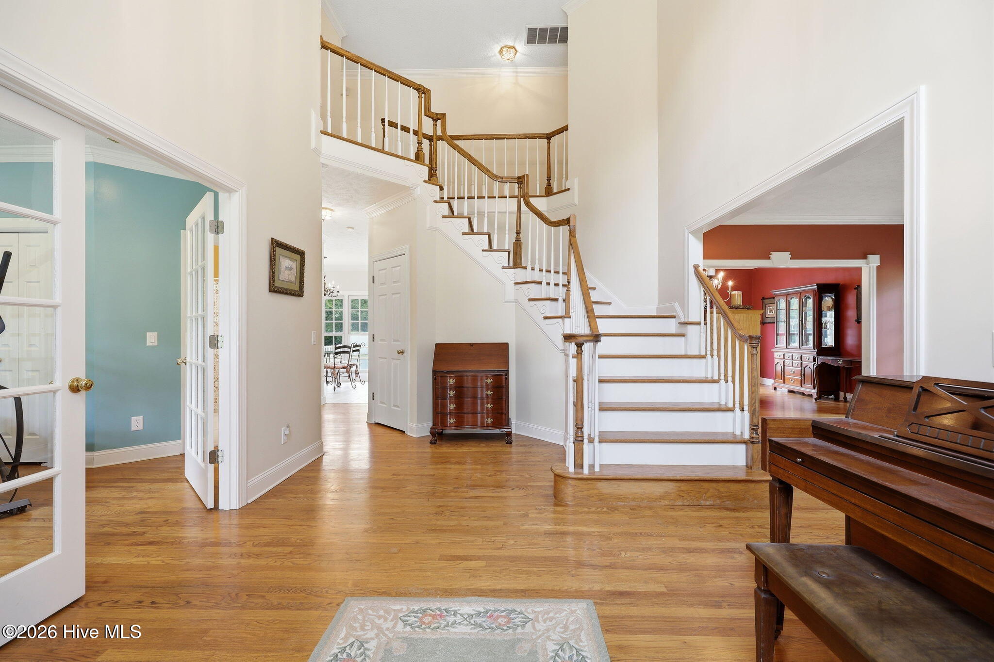 4076 Mobleys Bridge Road Grimesland, NC 27837 - Photo 9 of 66 Step into this well designed home with cathedral foyer with transitional design