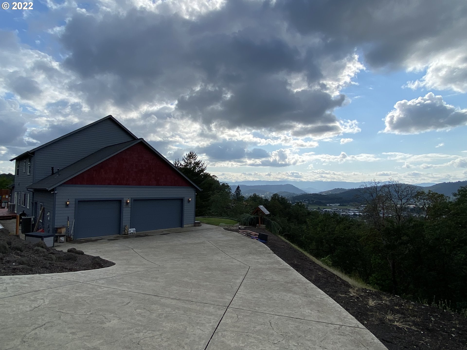 1548 Northeast Rocky Ridge Drive Roseburg, OR 97470 - Photo 1 of 31 a view of house with yard and green space