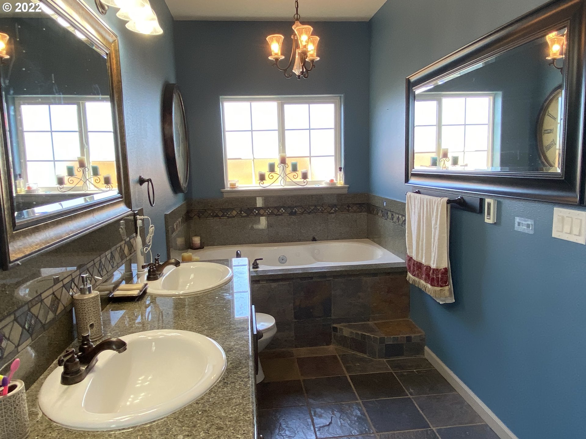 1548 Northeast Rocky Ridge Drive Roseburg, OR 97470 - Photo 19 of 31 a bathroom with a sink and a mirror
