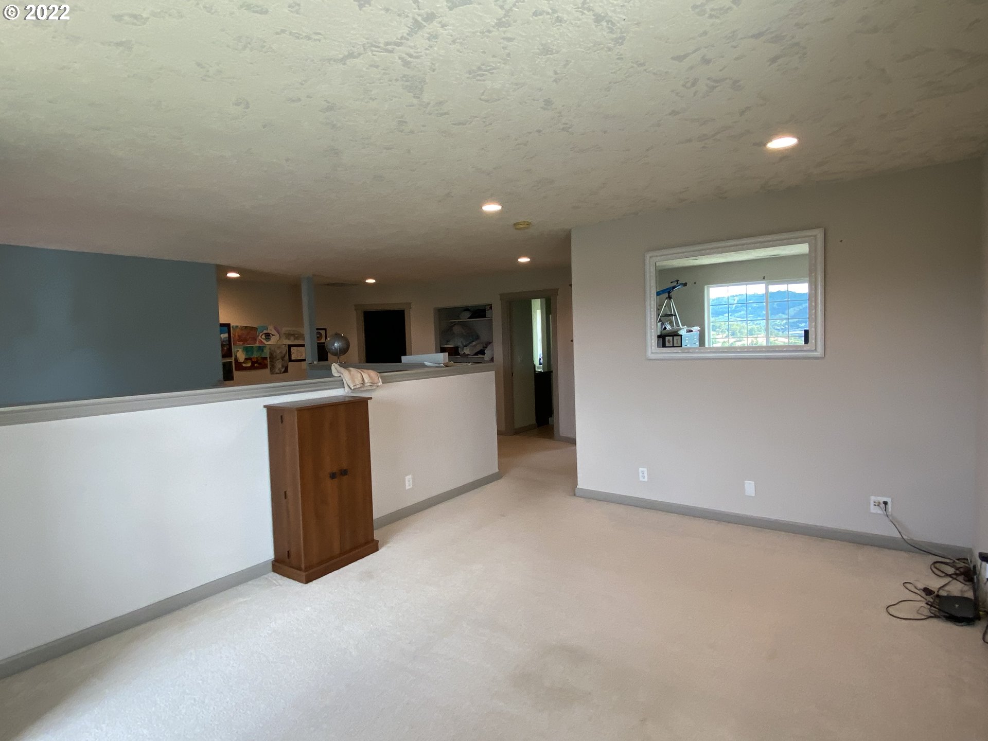 1548 Northeast Rocky Ridge Drive Roseburg, OR 97470 - Photo 23 of 31 a view of a kitchen with furniture and a ceiling fan